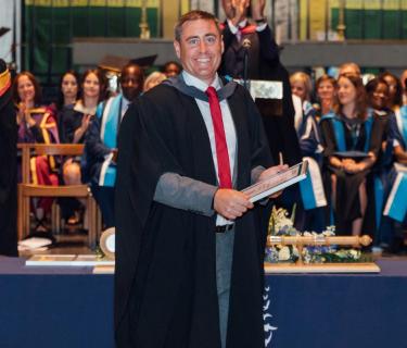 Arden Student at a graduation