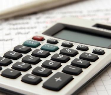 calculator on top of a piece of paper