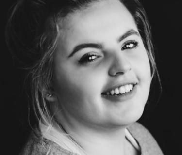 Black and white headshot of an Arden student