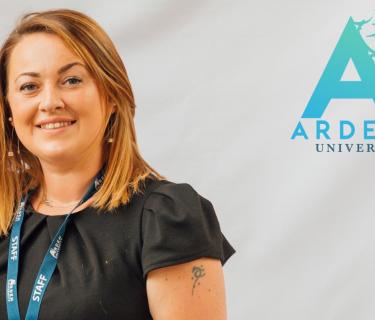 Arden student with Arden University logo in top right corner