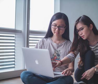 Women working on a laptop