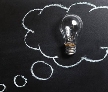 Lightbulb on chalk board