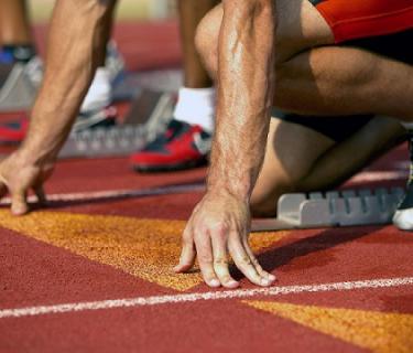 Runner on a running block