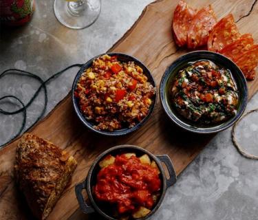 A restaurant table with food on it