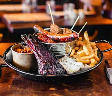 A restaurant table with food on it