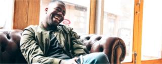 Arden University student studying in a cafe