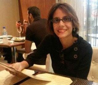 Woman holding dinner menu 